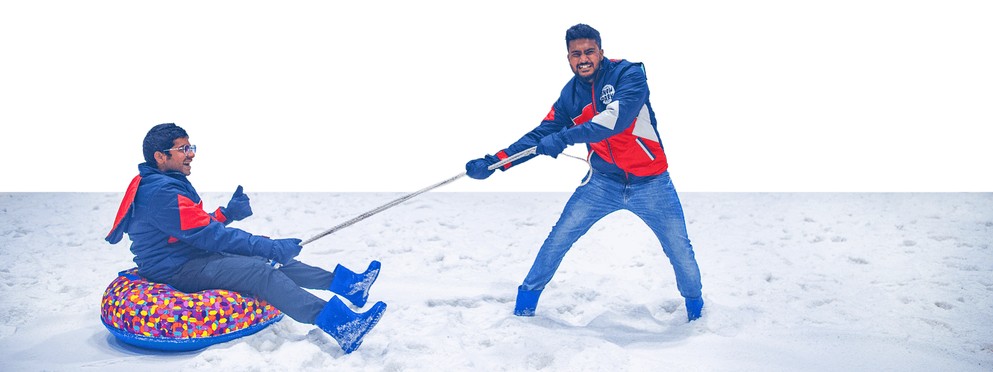 Friends enjoying snow tube ride at GRS Snow Park